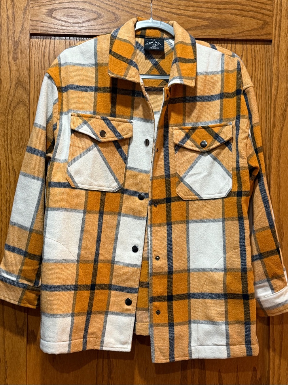 Women’s Plaid Shacket in Orange and Cream with chest and side pockets
